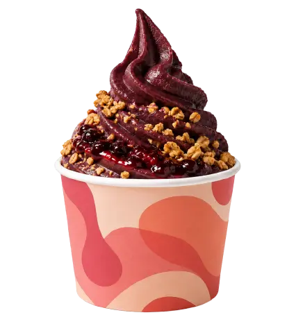 Açaí style dessert with granola and berry sauce